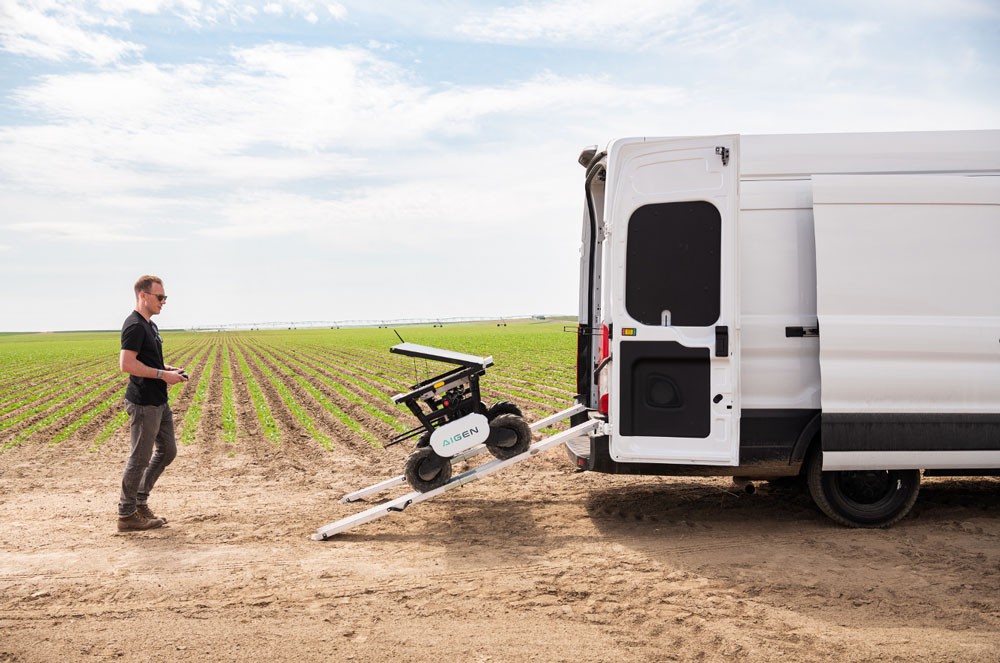 Photo of Compute for Climate Fellow startup Aigen’s autonomous AI solar-powered weeding robot in the field. Photo credit: Aigen