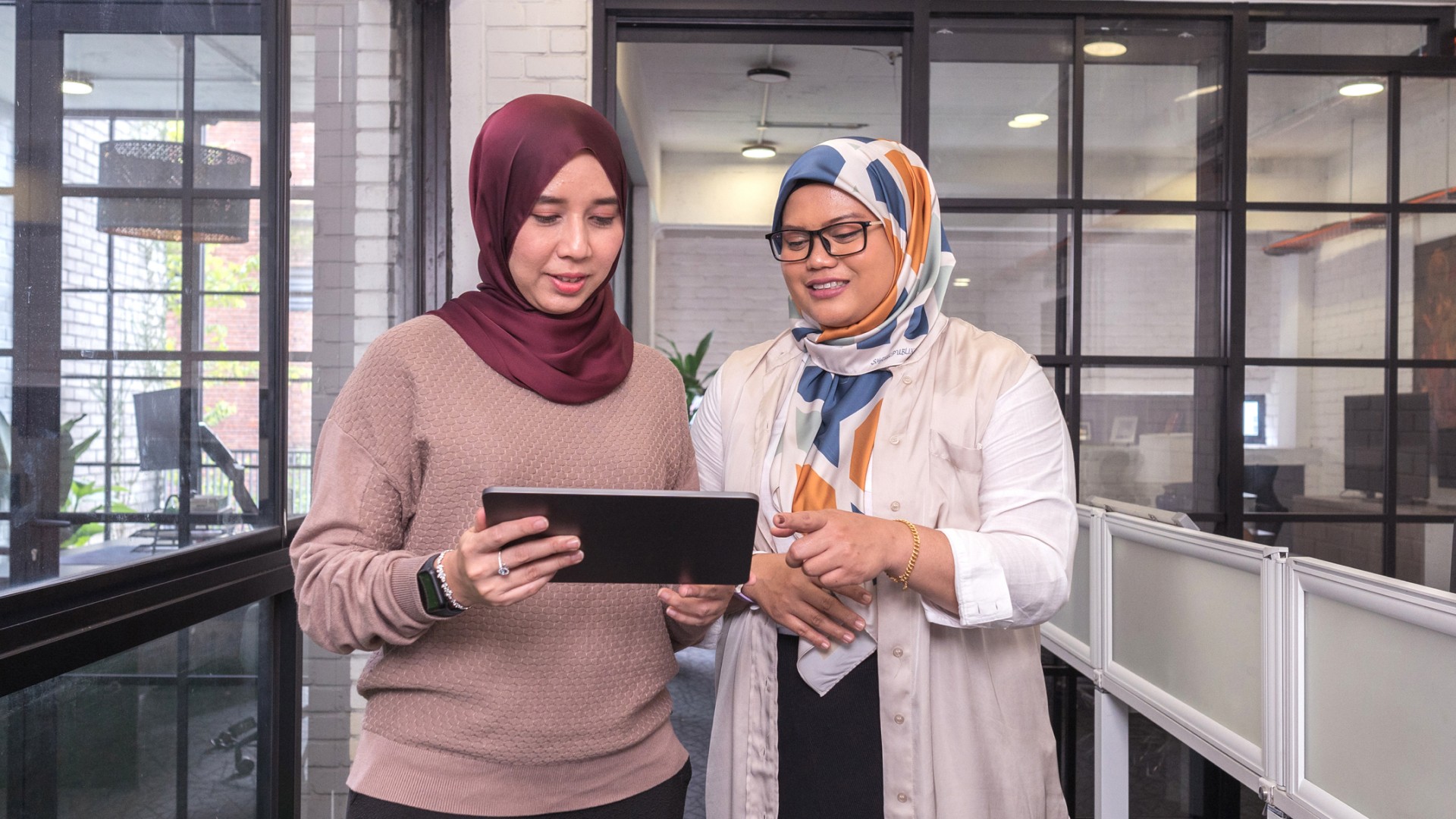 Women looking at screen