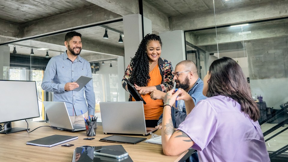 Colleagues around a desk